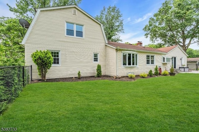 750 Saint Georges Rd, Bridgewater Twp, NJ 08807 - back of property featuring a gambrel roof and a chimney