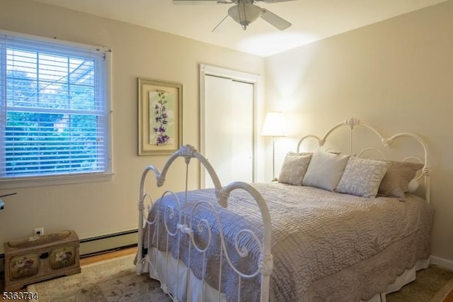 127 Walnut Ave, Franklin Twp, NJ 08873 - bedroom with a baseboard radiator, a closet, and ceiling fan