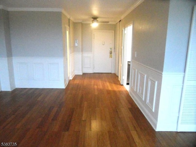 276 Prospect St, East Orange City, NJ 07017 - corridor with crown molding, a decorative wall, wood finished floors, and wainscoting