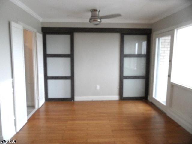 276 Prospect St, East Orange City, NJ 07017 - unfurnished room featuring ornamental molding, light wood-type flooring, and baseboards