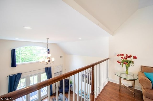 42 Bluffs Ct, Hamburg Boro, NJ 07419 - hall with a chandelier, wood finished floors, recessed lighting, baseboards, and high vaulted ceiling