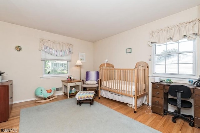 24 Forest Dr, Roxbury Twp, NJ 07876 - bedroom featuring light wood-style flooring