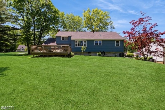 24 Forest Dr, Roxbury Twp, NJ 07876 - back of property featuring a wooden deck and a lawn