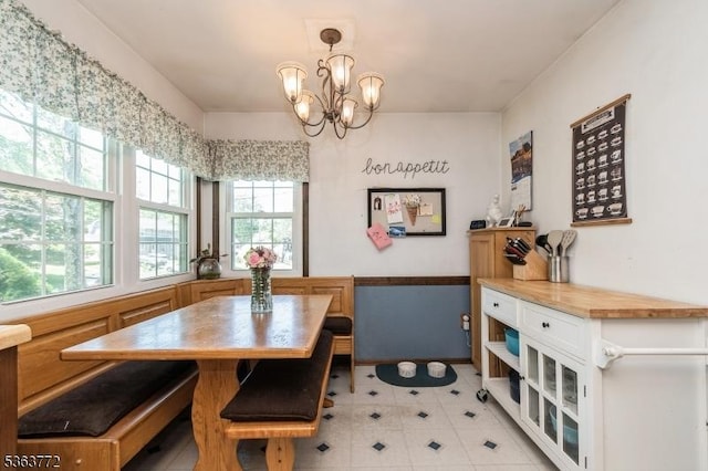 24 Forest Dr, Roxbury Twp, NJ 07876 - dining area with a chandelier and light tile patterned floors