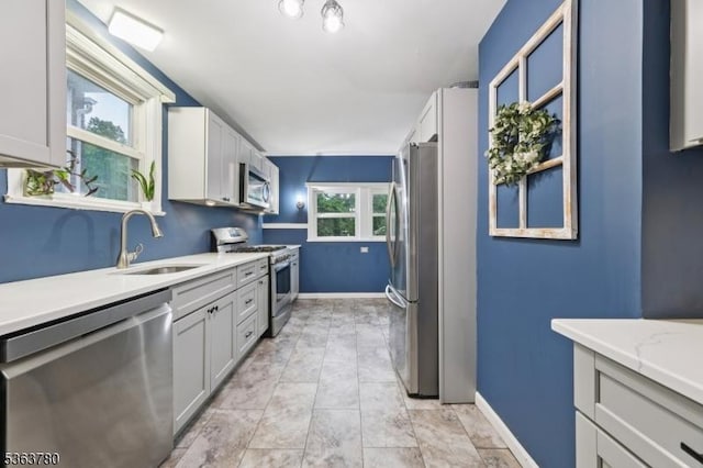 118 E Lincoln Ave, Roselle Park Boro, NJ 07204 - kitchen with appliances with stainless steel finishes and light countertops