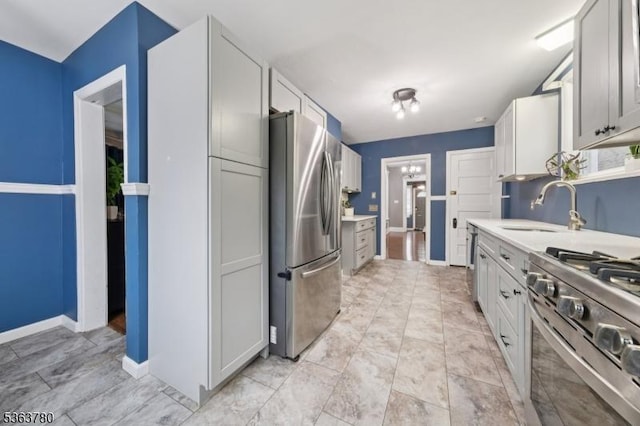 118 E Lincoln Ave, Roselle Park Boro, NJ 07204 - kitchen with appliances with stainless steel finishes and light countertops