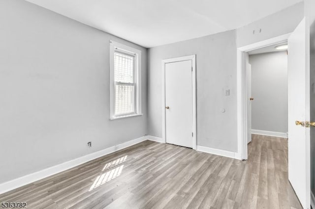 410-412 Kerrigan Blvd, Newark City, NJ 07106 - unfurnished bedroom with wood finished floors and baseboards