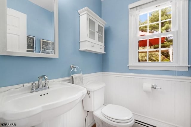 28 Douglas Dr, Washington Twp, NJ 07853 - half bathroom with a sink and wainscoting