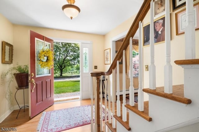 28 Douglas Dr, Washington Twp, NJ 07853 - entrance foyer with light wood finished floors and stairs