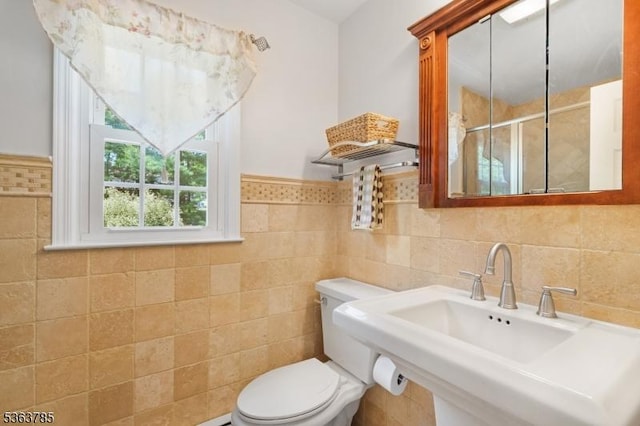 28 Douglas Dr, Washington Twp, NJ 07853 - full bathroom with a stall shower, tile walls, and wainscoting