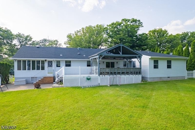 39 Mildred Ter, Clark Twp, NJ 07066 - back of property featuring a yard, a patio, crawl space, and a deck