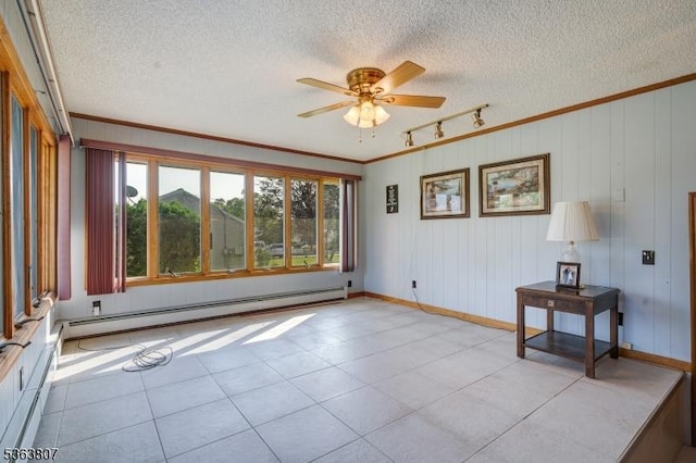 39 Mildred Ter, Clark Twp, NJ 07066 - empty room with a baseboard radiator, a ceiling fan, crown molding, a textured ceiling, and rail lighting