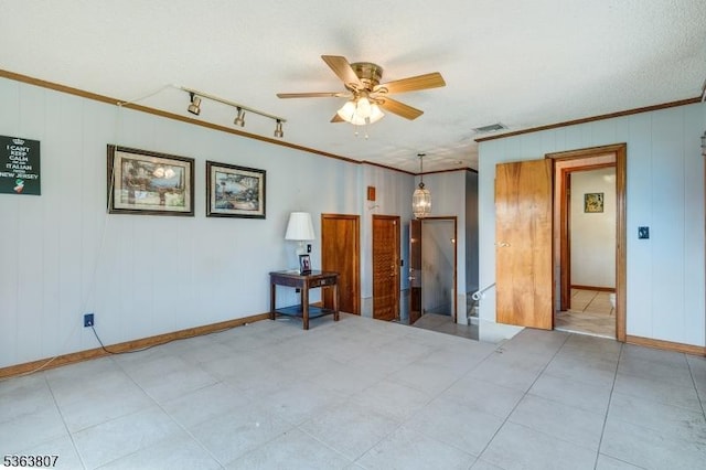 39 Mildred Ter, Clark Twp, NJ 07066 - empty room with ceiling fan and ornamental molding