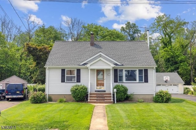 214 Glenside Pl, North Plainfield Boro, NJ 07060 - view of front of home with an outbuilding, a front lawn, and a shingled roof