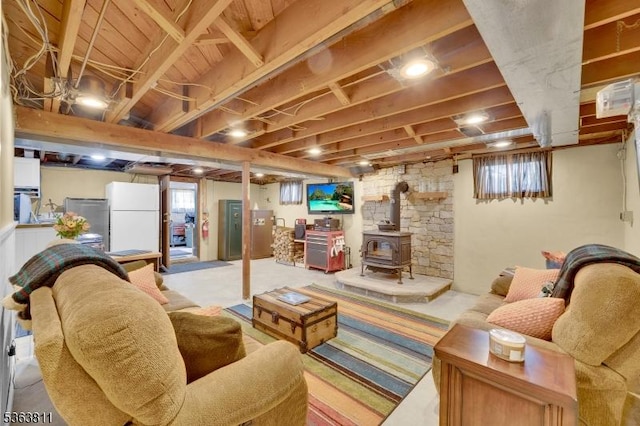 214 Glenside Pl, North Plainfield Boro, NJ 07060 - living area featuring plenty of natural light and a wood stove