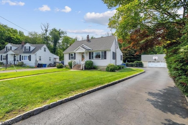 214 Glenside Pl, North Plainfield Boro, NJ 07060 - bungalow with a detached garage, a front lawn, and a chimney
