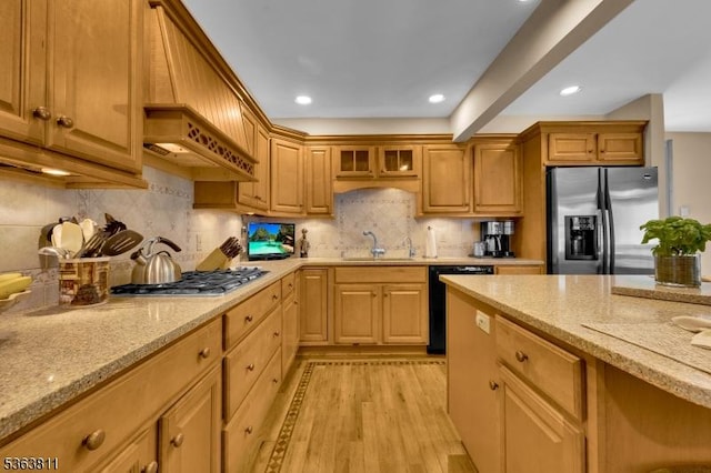 214 Glenside Pl, North Plainfield Boro, NJ 07060 - kitchen featuring appliances with stainless steel finishes, light stone counters, light wood-type flooring, backsplash, and recessed lighting