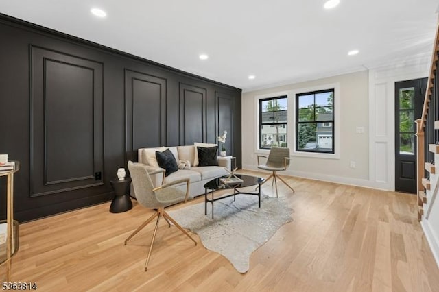 68 Irving Ave, Livingston Twp, NJ 07039 - living room with a decorative wall, ornamental molding, recessed lighting, and light wood-style flooring