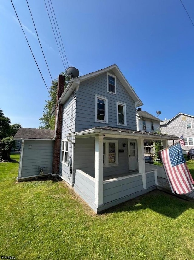 37 Cornish St, Washington Boro, NJ 07882 - back of property with a chimney and a lawn