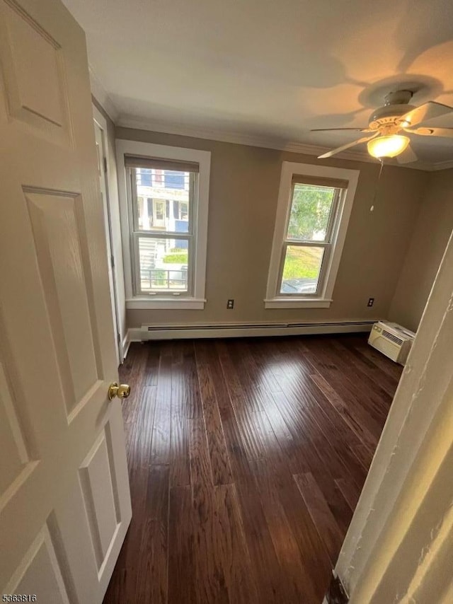 37 Cornish St, Washington Boro, NJ 07882 - empty room with dark wood finished floors, a baseboard radiator, crown molding, and ceiling fan