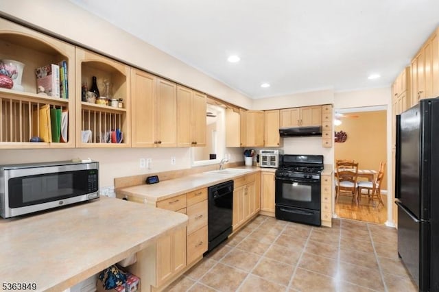 2001 Grant Ave, South Plainfield Boro, NJ 07080 - kitchen featuring black appliances, light brown cabinets, a sink, light countertops, and under cabinet range hood