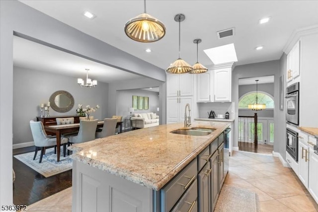 301 Diamond Hill Rd, Berkeley Heights Twp, NJ 07922 - kitchen featuring stainless steel appliances, a chandelier, white cabinetry, light stone countertops, and recessed lighting