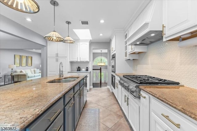 301 Diamond Hill Rd, Berkeley Heights Twp, NJ 07922 - kitchen featuring stainless steel appliances, premium range hood, white cabinets, light tile patterned floors, and tasteful backsplash