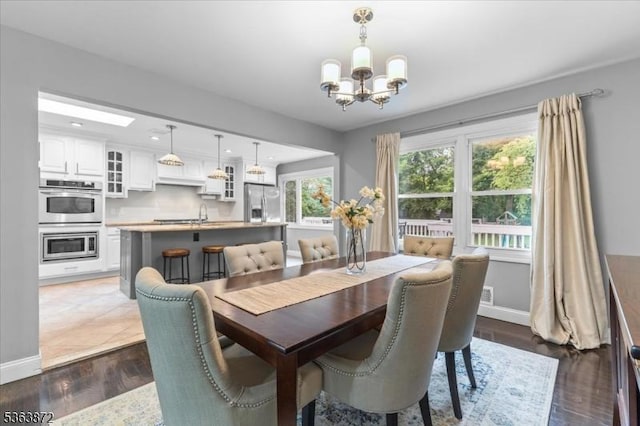 301 Diamond Hill Rd, Berkeley Heights Twp, NJ 07922 - dining area with a chandelier and wood finished floors