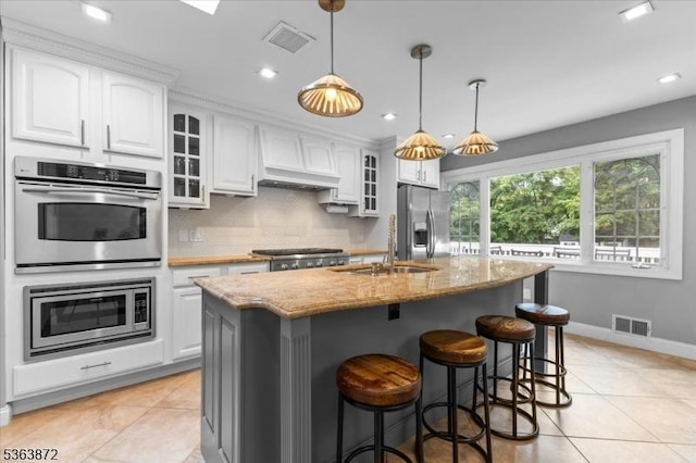 301 Diamond Hill Rd, Berkeley Heights Twp, NJ 07922 - kitchen with appliances with stainless steel finishes, light stone countertops, white cabinets, tasteful backsplash, and recessed lighting