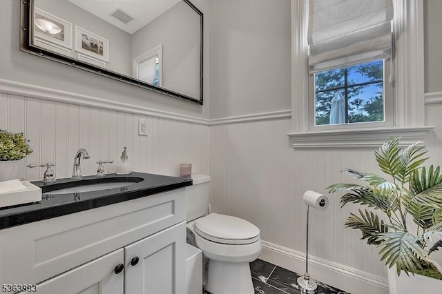 10 Central Ave Unit C, Caldwell Boro Twp, NJ 07006 - bathroom with vanity, wainscoting, and a decorative wall