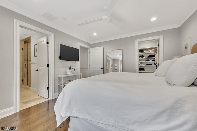 10 Central Ave Unit C, Caldwell Boro Twp, NJ 07006 - bedroom with wood finished floors, ornamental molding, recessed lighting, ensuite bathroom, and a spacious closet