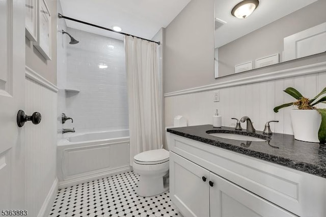10 Central Ave Unit C, Caldwell Boro Twp, NJ 07006 - bathroom with vanity, shower / bath combo with shower curtain, wainscoting, and tile patterned floors