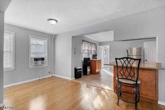 136 Willow St, Bloomfield Twp, NJ 07003 - living room with light wood-style floors, healthy amount of natural light, cooling unit, and baseboards