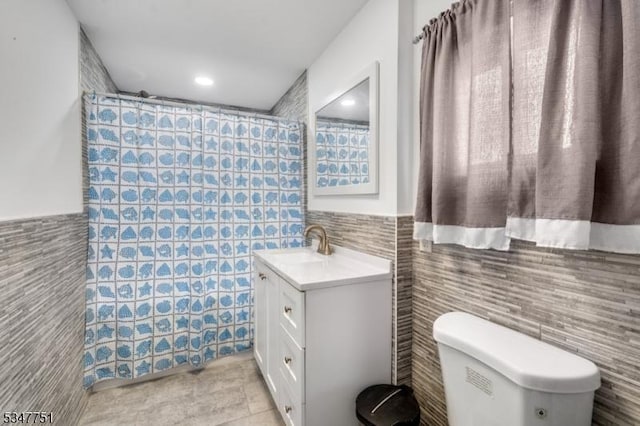 136 Willow St, Bloomfield Twp, NJ 07003 - full bath featuring tile walls, vanity, toilet, a shower with curtain, and tile patterned flooring