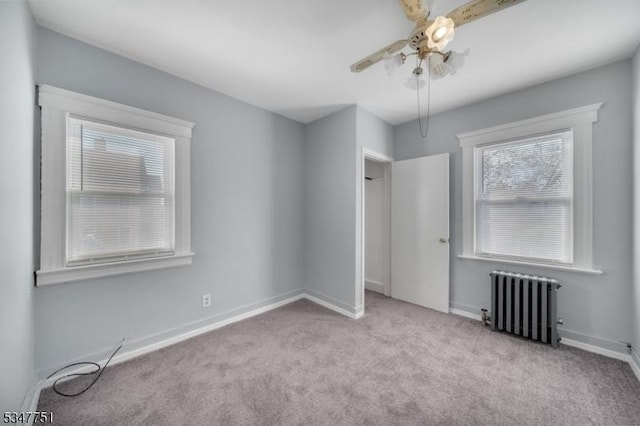 136 Willow St, Bloomfield Twp, NJ 07003 - unfurnished bedroom with radiator heating unit, carpet floors, baseboards, and ceiling fan