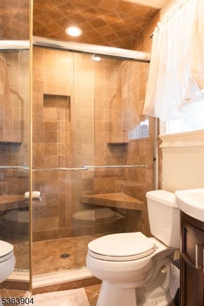 2 Monsey Rd, Raritan Twp, NJ 08822 - full bath with toilet, vanity, and a stall shower