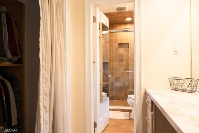 2 Monsey Rd, Raritan Twp, NJ 08822 - bathroom with a shower stall, vanity, a spacious closet, tile patterned flooring, and recessed lighting