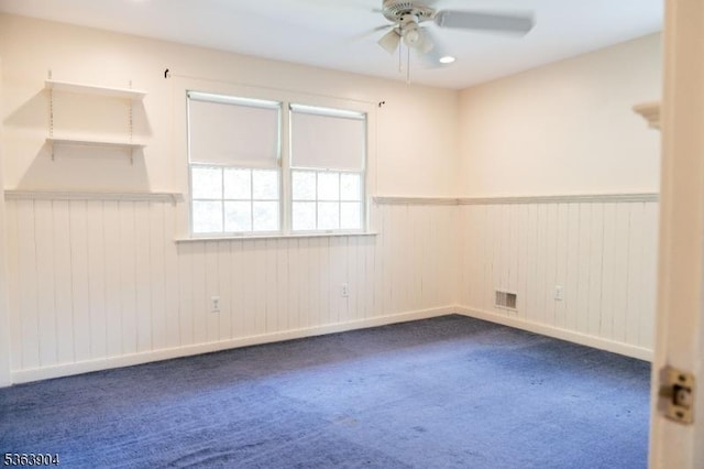 2 Monsey Rd, Raritan Twp, NJ 08822 - empty room featuring wainscoting, a ceiling fan, and dark carpet
