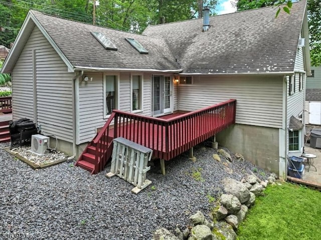 23 Panorama Dr, Vernon Twp, NJ 07461 - back of property featuring roof with shingles and a deck