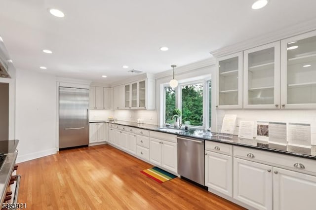 75 Farley Rd, Millburn Twp, NJ 07078 - kitchen featuring appliances with stainless steel finishes, white cabinets, dark countertops, and recessed lighting