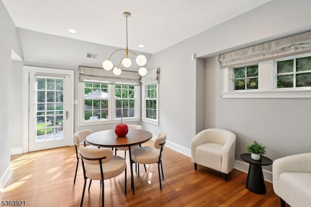 75 Farley Rd, Millburn Twp, NJ 07078 - dining space with a chandelier, healthy amount of natural light, wood finished floors, and recessed lighting