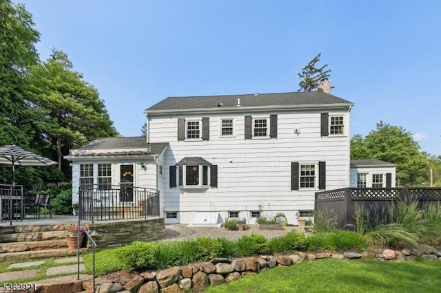 75 Farley Rd, Millburn Twp, NJ 07078 - back of property with a chimney and a patio area