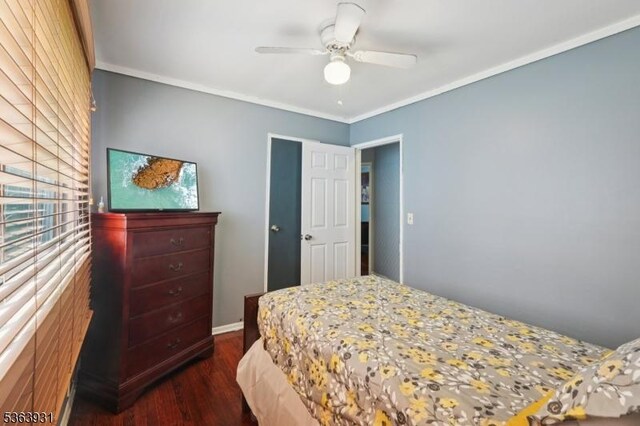 9 Lee Ct, Maplewood Twp, NJ 07040 - bedroom with crown molding, dark wood-style flooring, and ceiling fan