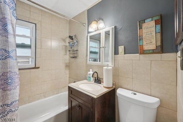 9 Lee Ct, Maplewood Twp, NJ 07040 - bathroom with vanity, shower / bath combo with shower curtain, and tile walls