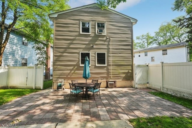 9 Lee Ct, Maplewood Twp, NJ 07040 - rear view of house featuring a patio area and outdoor dining space