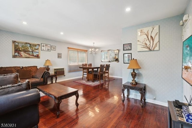 9 Lee Ct, Maplewood Twp, NJ 07040 - living area with a chandelier, wood finished floors, recessed lighting, wallpapered walls, and a wall mounted air conditioner