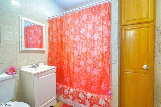 63 Grove St, Bloomfield Twp, NJ 07003 - full bath featuring vanity and tile walls