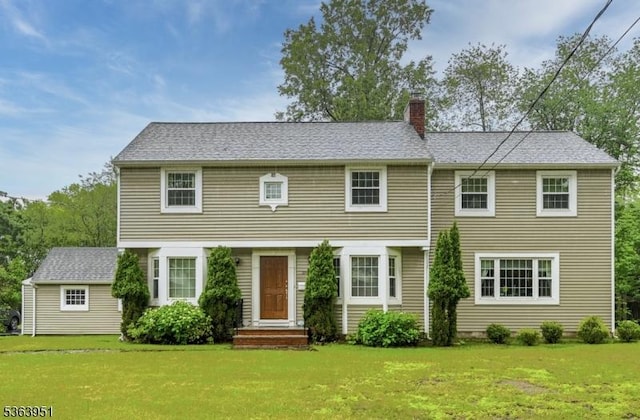 329 Hillside Ave, Livingston Twp, NJ 07039 - colonial inspired home with a chimney and a front yard