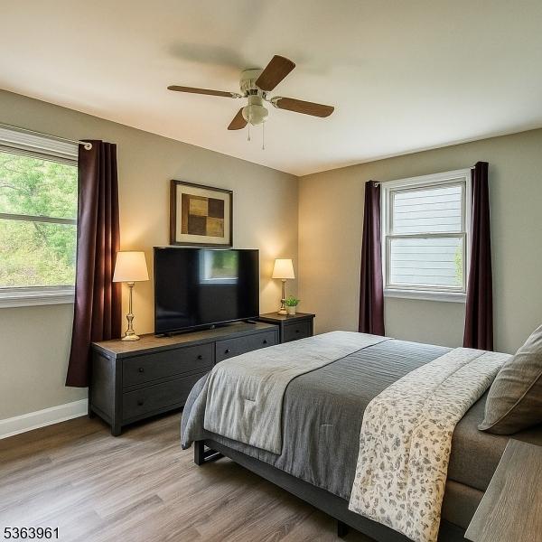 935C E Front St Unit C, Plainfield City, NJ 07062 - bedroom featuring light wood-type flooring and a ceiling fan