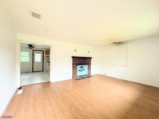 30 Bennington Pkwy, Franklin Twp, NJ 08823 - unfurnished living room with a fireplace and light wood finished floors